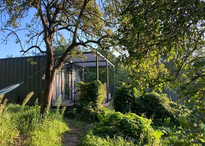 Domy W Ogrodzie - Riverfront Cabins
